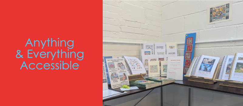 Display of books and brochures on a table with 'Anything & Everything Accessible' text on a red background.