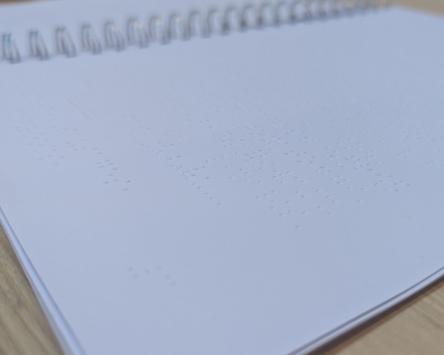 a photo of a page full of braille text