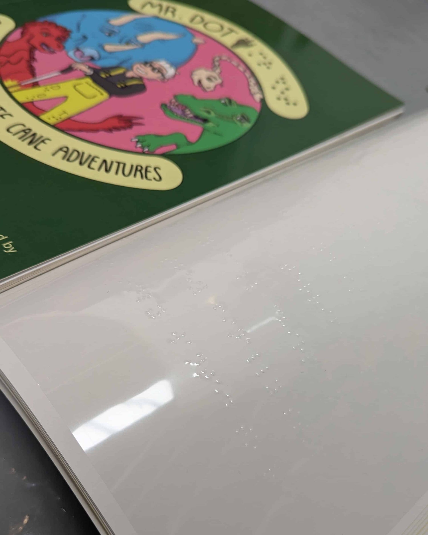a photo of a braille book open to a page