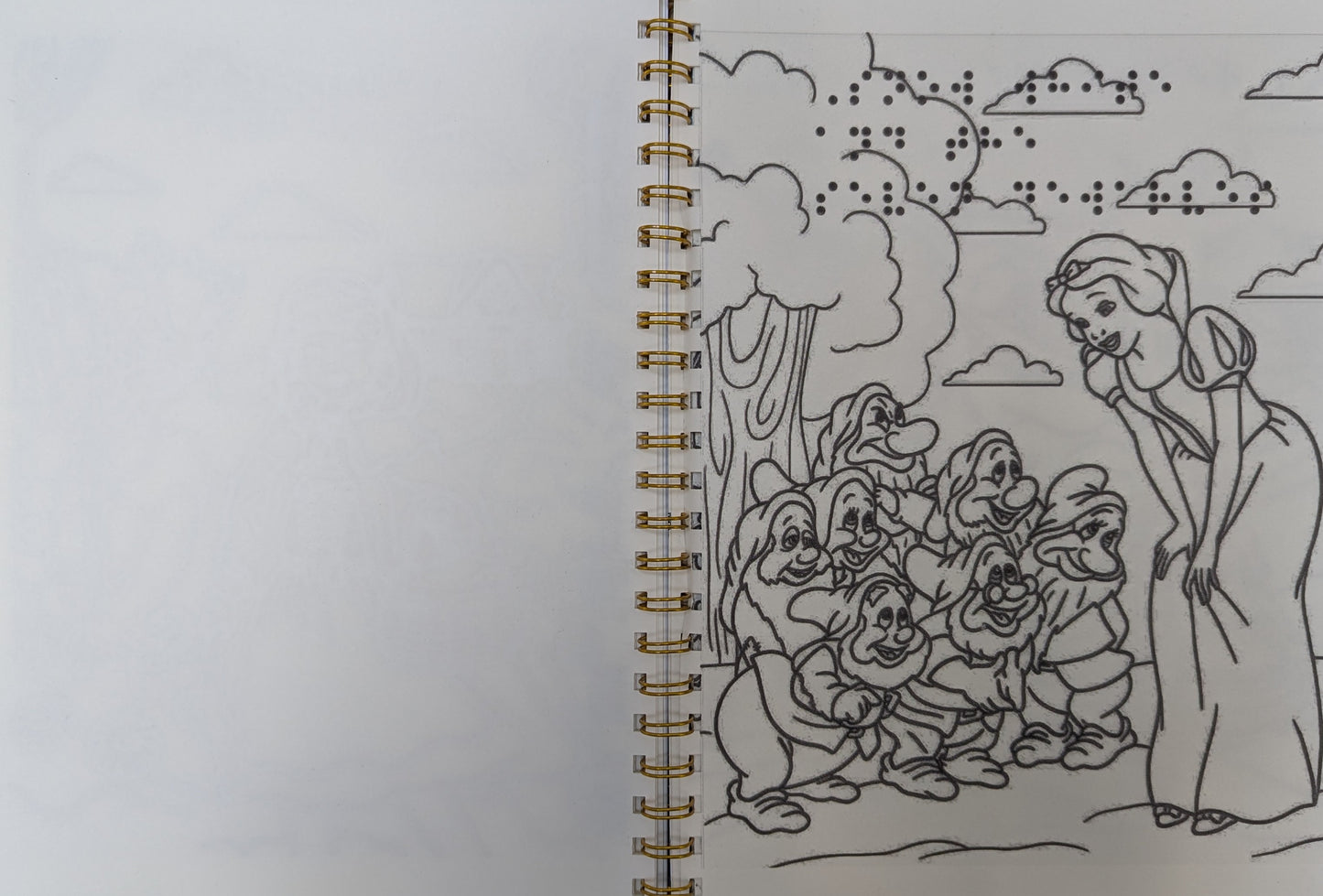 braille colouring book page of an Illustration of a woman and seven dwarfs on a spiral-bound notebook page.